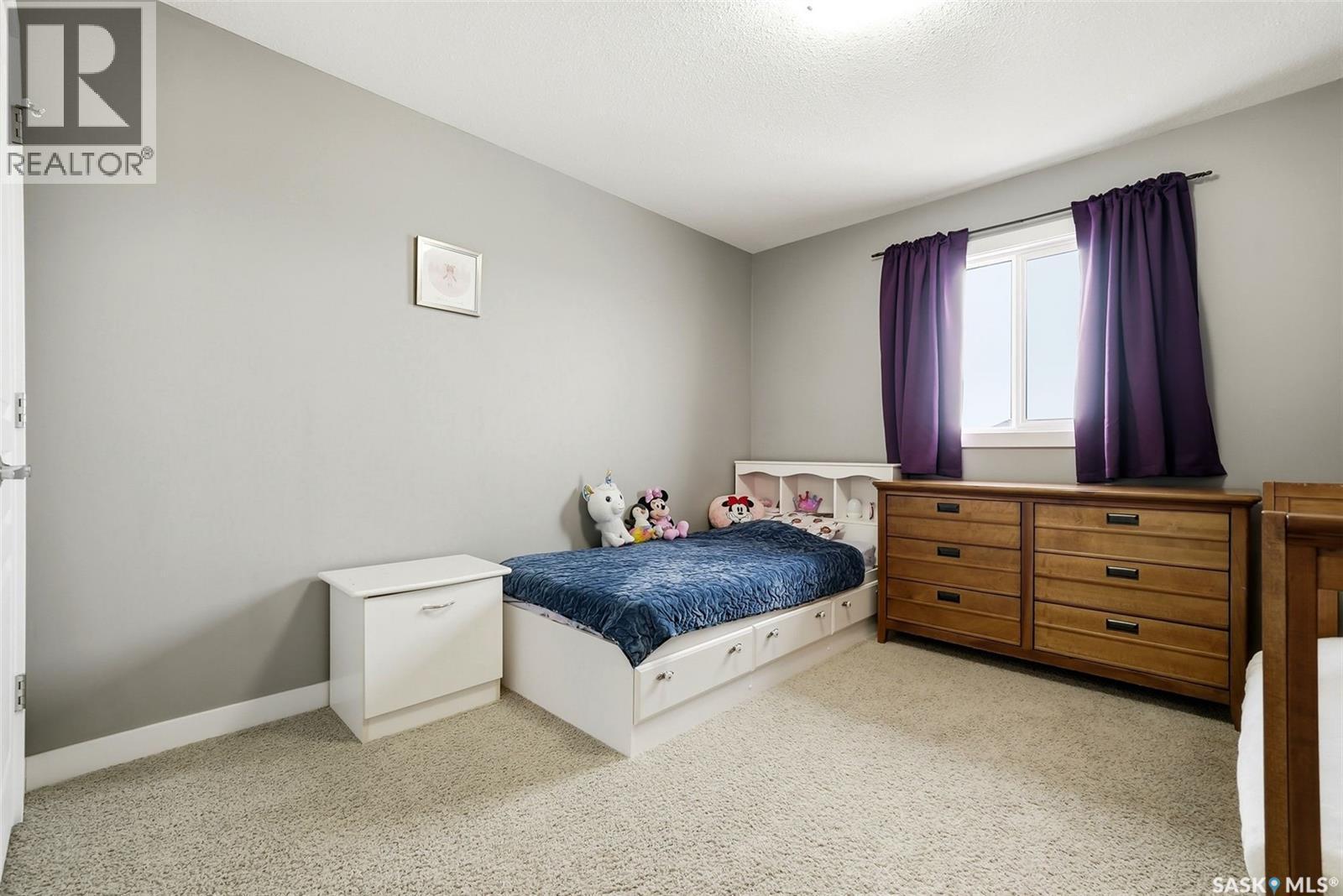 5343 Universal Crescent, Regina, SK - Indoor Photo Showing Bedroom