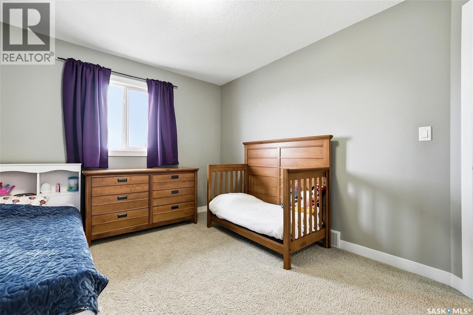 5343 Universal Crescent, Regina, SK - Indoor Photo Showing Bedroom
