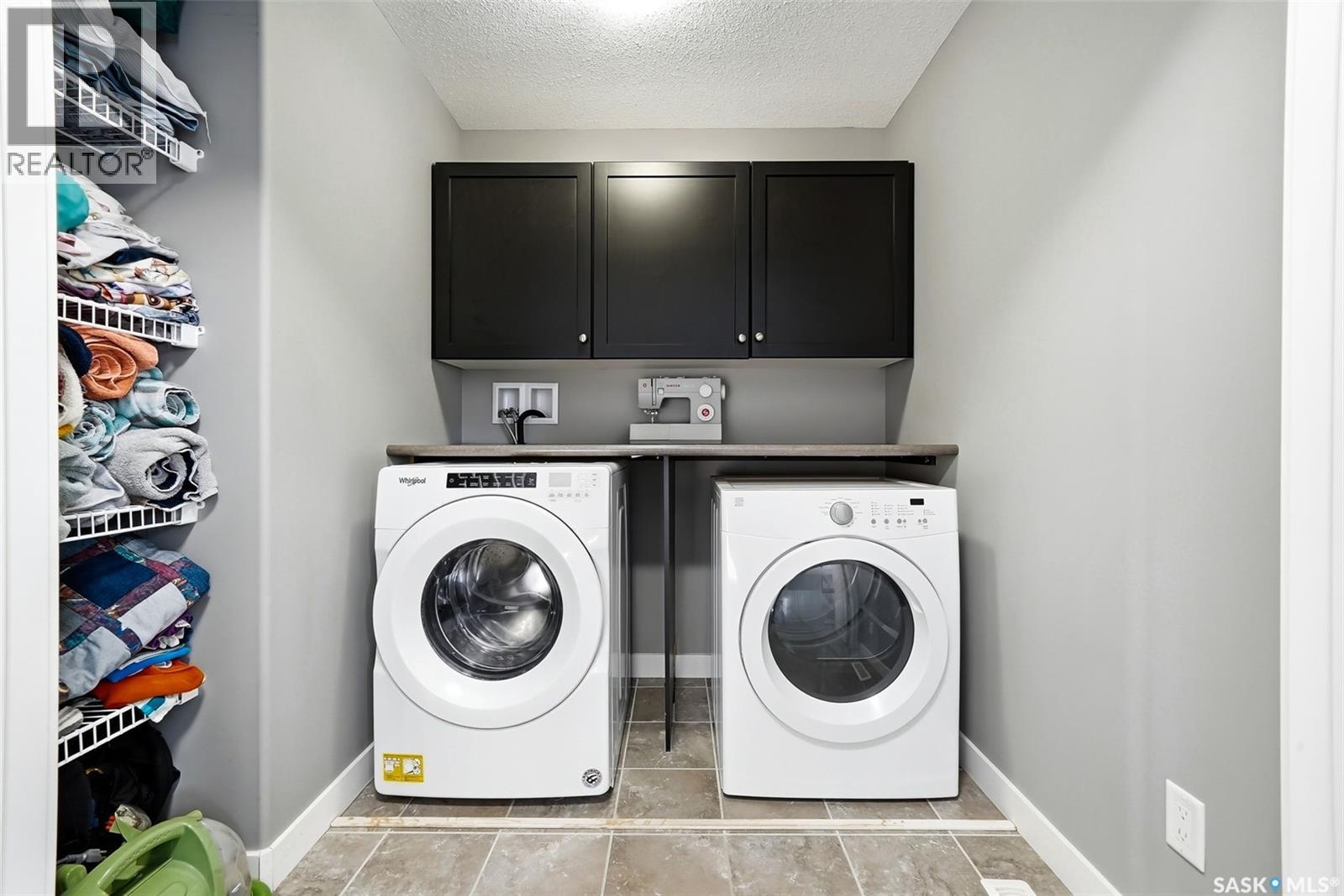 5343 Universal Crescent, Regina, SK - Indoor Photo Showing Laundry Room