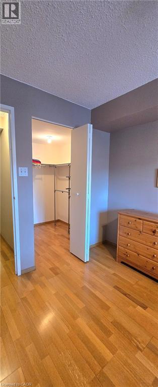 Walk-in Closet in Primary Bedroom - 175 E Hunter Street E Unit# 404, Hamilton, ON - Indoor Photo Showing Other Room