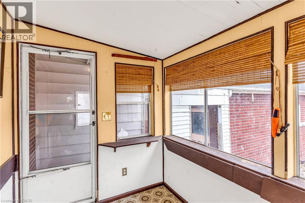 View of property's community with ornamental molding and vaulted ceiling - 41 Floral Crescent, Kitchener, ON - Indoor Photo Showing Other Room