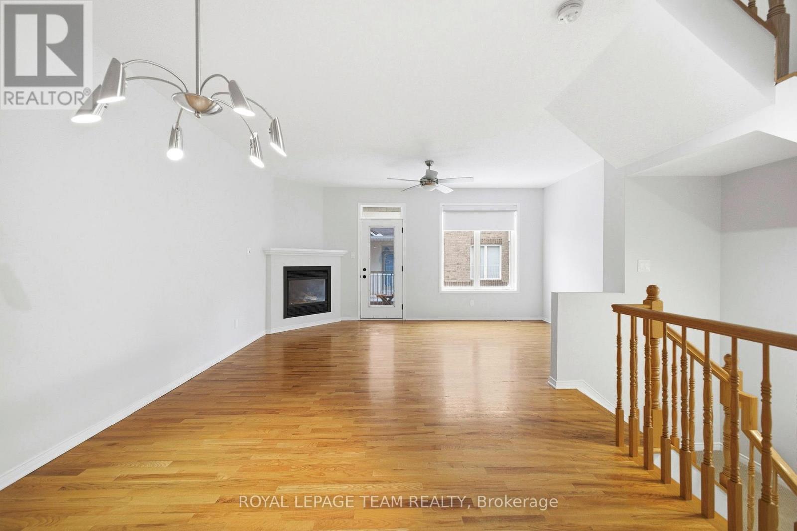 5 Island Creek Private, Ottawa, ON - Indoor Photo Showing Other Room With Fireplace