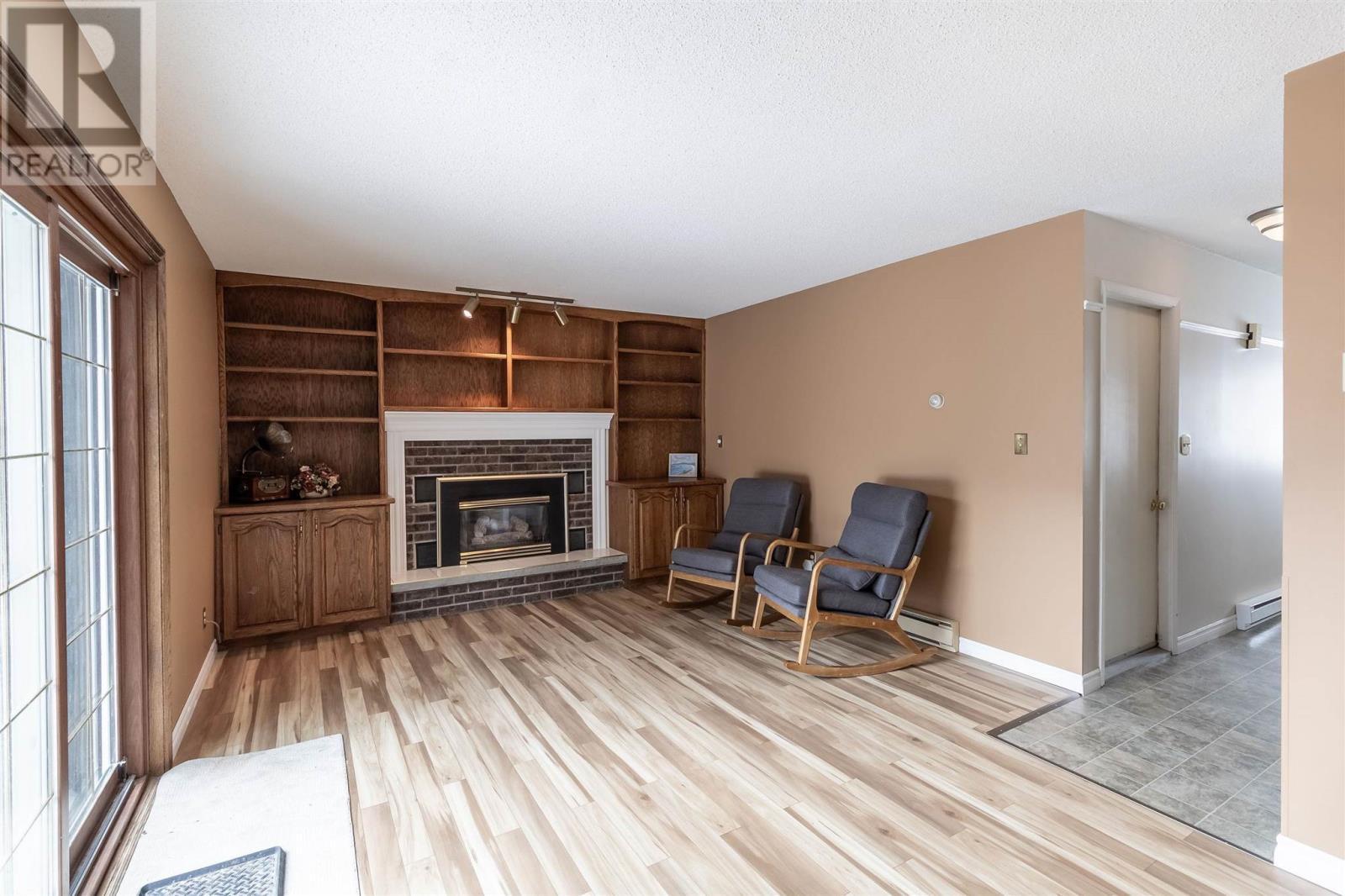 7 Golf Range Cres, Sault Ste. Marie, ON - Indoor Photo Showing Other Room With Fireplace