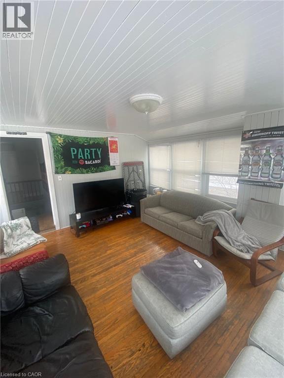 Living area featuring hardwood / wood-style floors - 9 Waterloo Avenue, Guelph, ON - Indoor Photo Showing Living Room