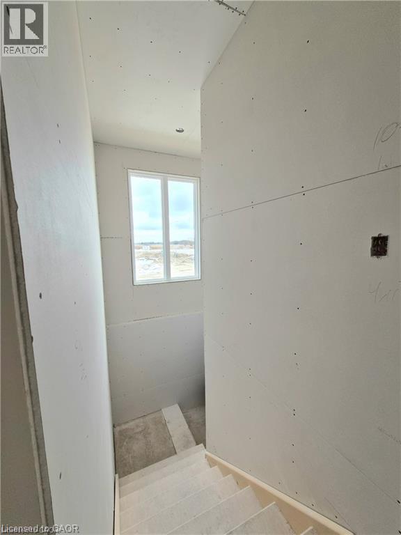 View of stairway - 106 Thackeray Way, Harriston, ON - Indoor Photo Showing Other Room