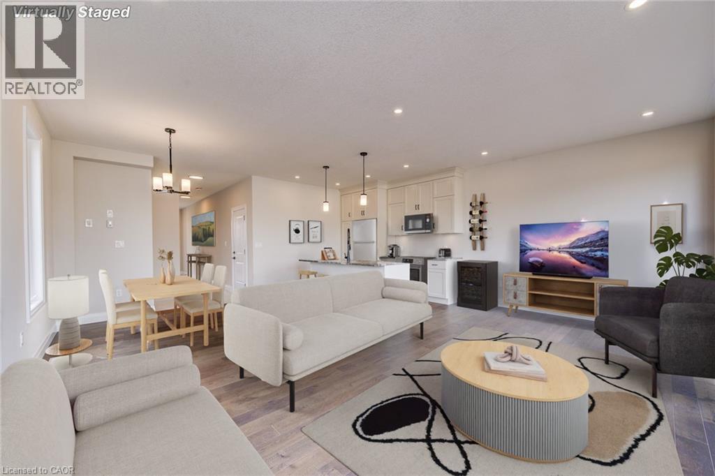 VIRTUALLY STAGED - 102 Thackeray Way, Harriston, ON - Indoor Photo Showing Living Room