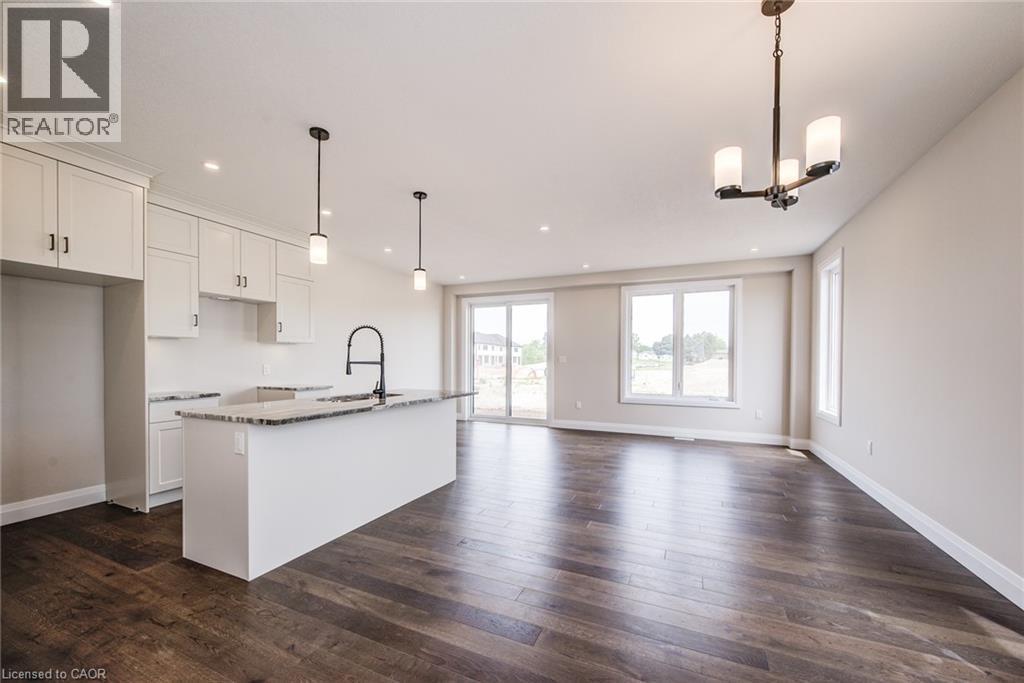 102 Thackeray Way, Harriston, ON - Indoor Photo Showing Kitchen With Upgraded Kitchen