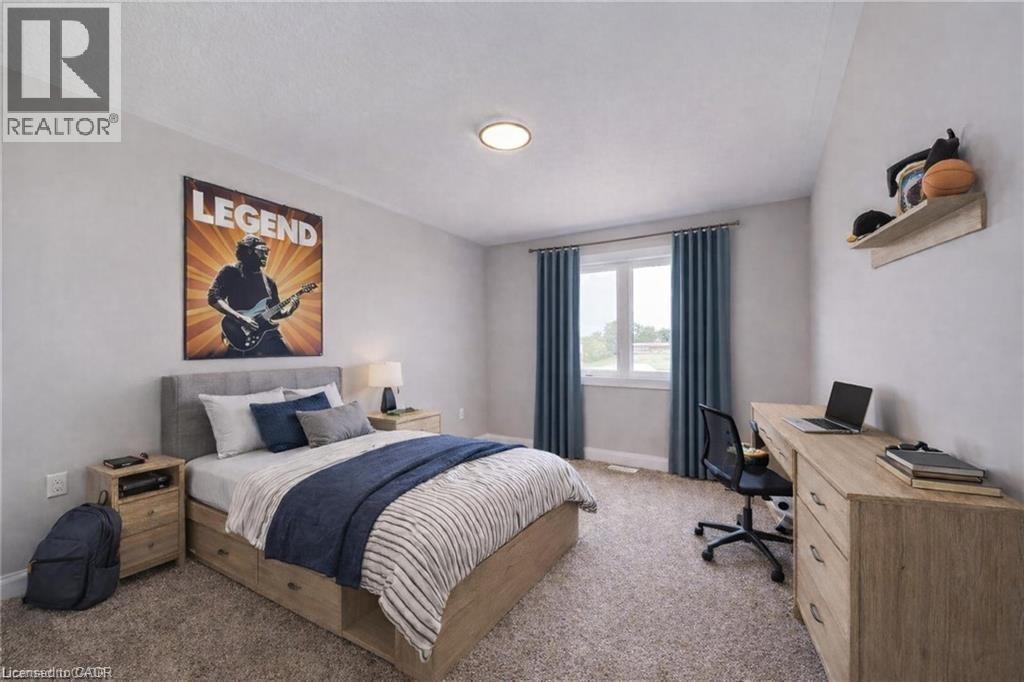 VIRTUALLY STAGED - 102 Thackeray Way, Harriston, ON - Indoor Photo Showing Bedroom