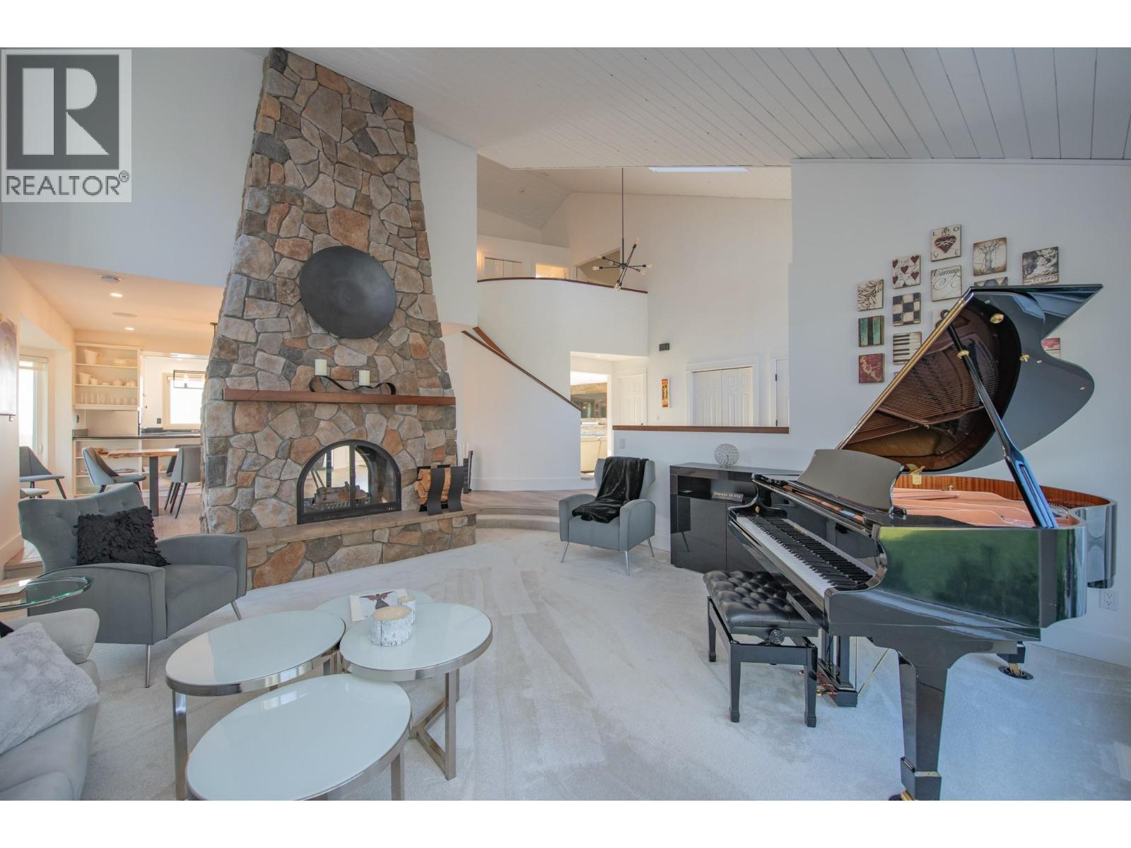 702 Cypress Drive, Coldstream, BC - Indoor Photo Showing Living Room With Fireplace