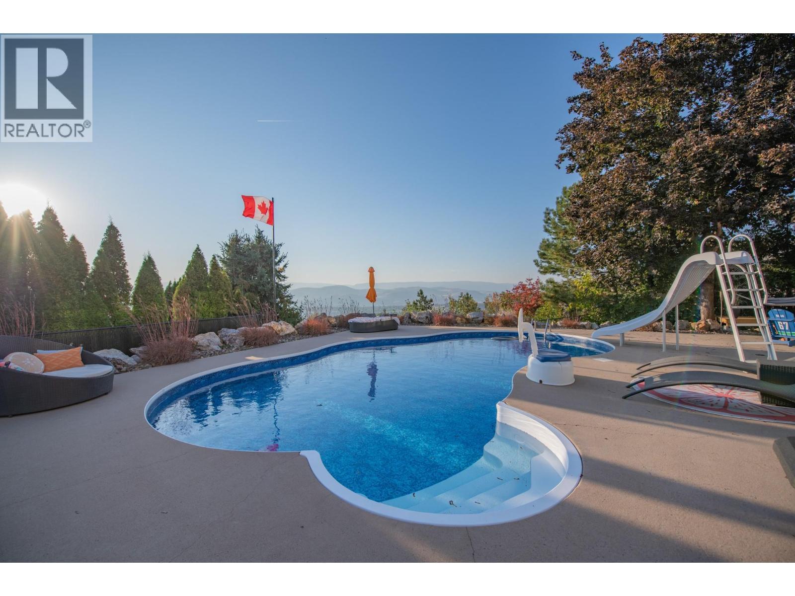 702 Cypress Drive, Coldstream, BC - Outdoor With In Ground Pool