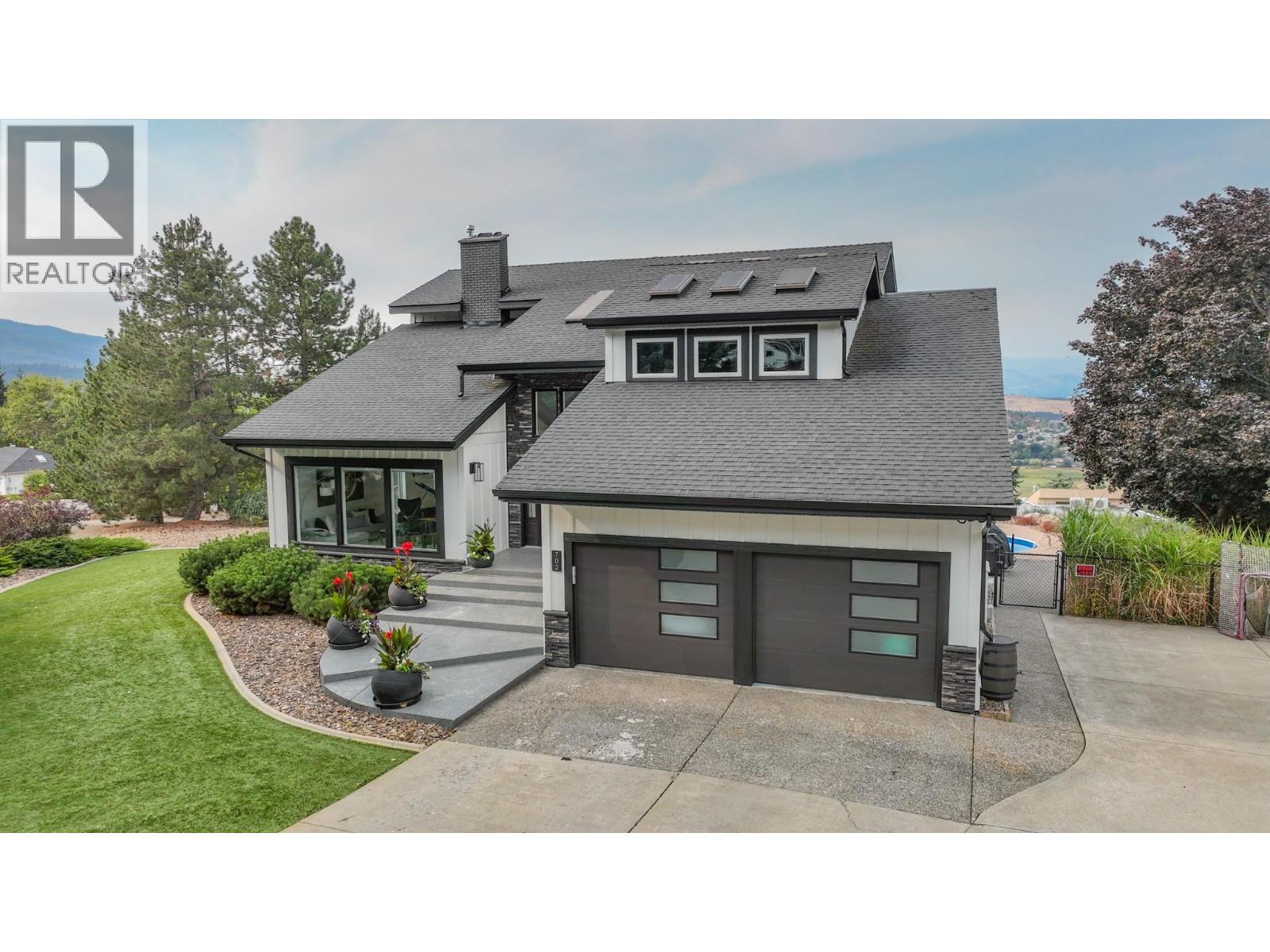 Welcome HOME! - 702 Cypress Drive, Coldstream, BC - Outdoor With Facade