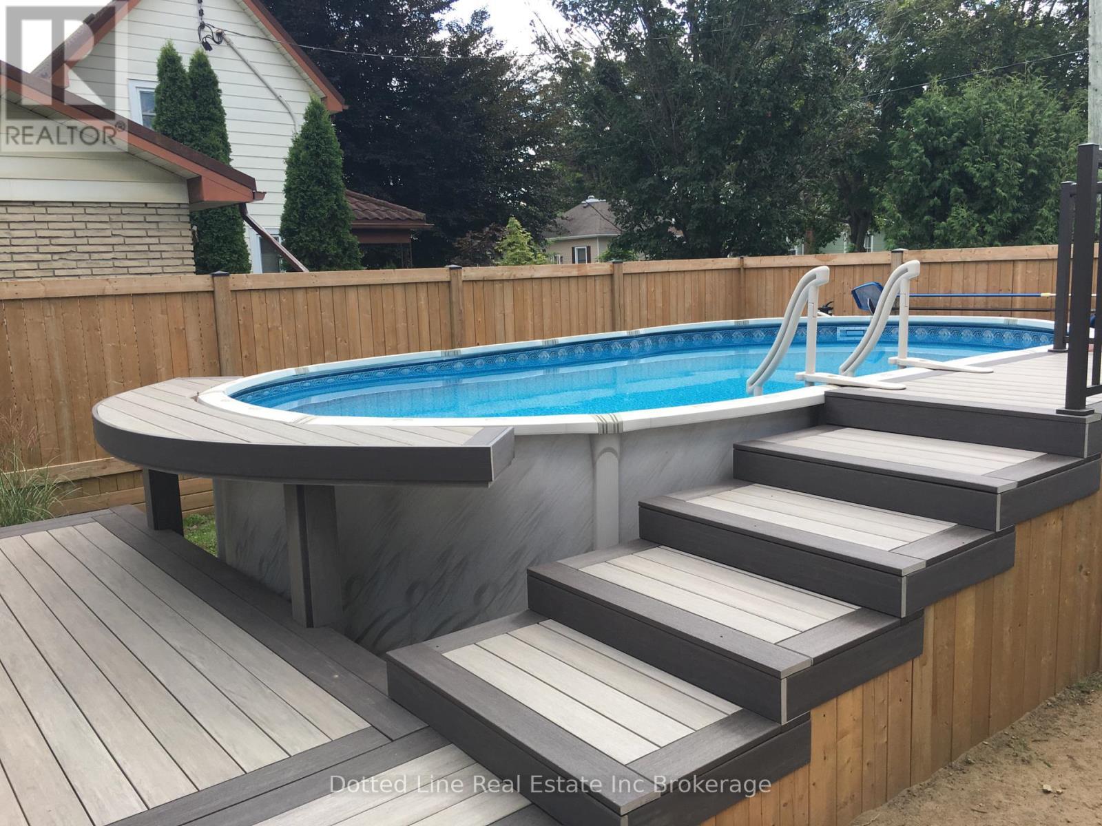 19 Wolf St - 19 Wolf Street, Tillsonburg, ON - Outdoor With Above Ground Pool With Deck Patio Veranda