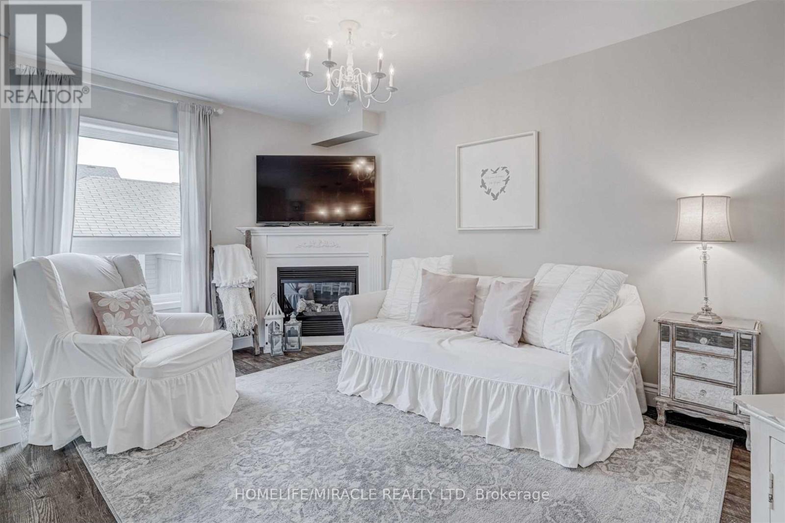 149 Carnwith Drive E, Whitby, ON - Indoor With Fireplace