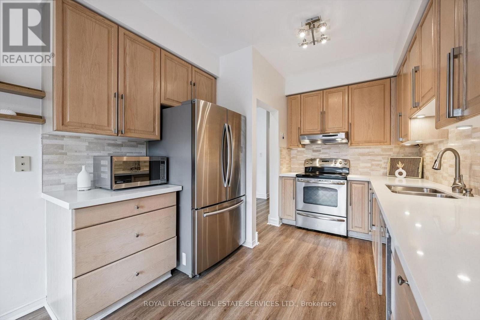 Stainless Steel Appliances - 1888 Stevington Crescent, Mississauga, ON - Indoor Photo Showing Kitchen With Stainless Steel Kitchen With Double Sink