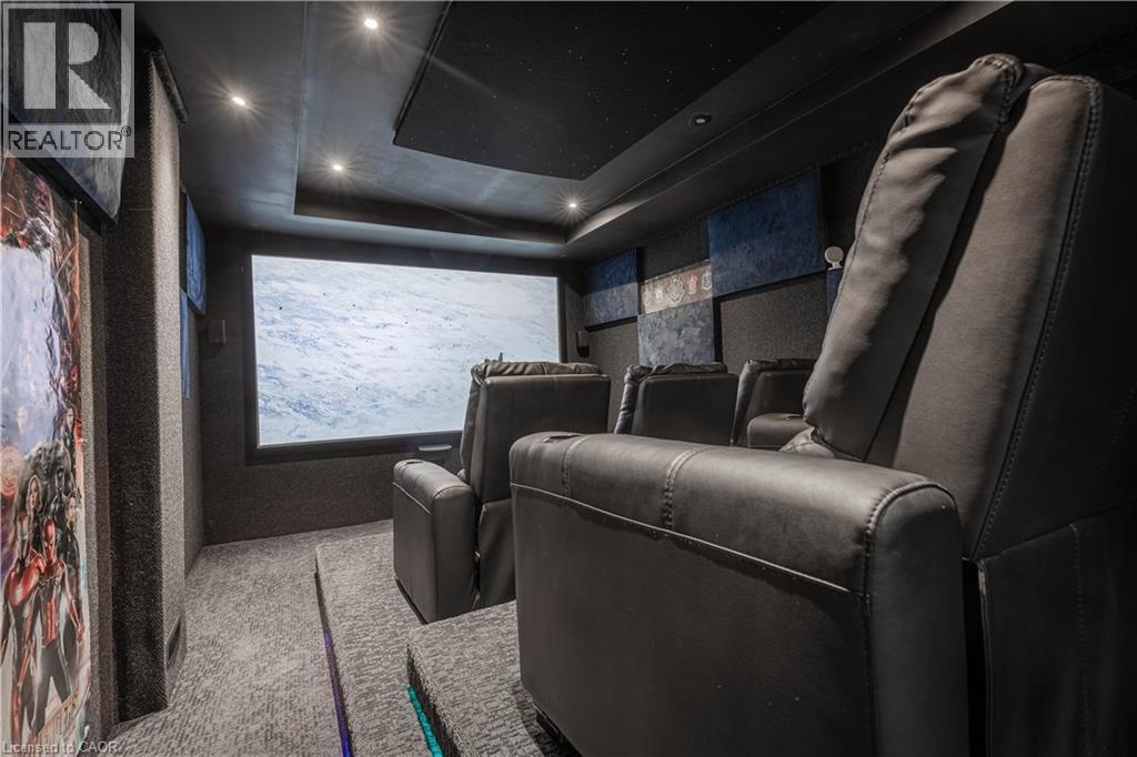 Cinema with carpet and a tray ceiling - 2719 Torrey Pines Way, London, ON - Indoor Photo Showing Other Room