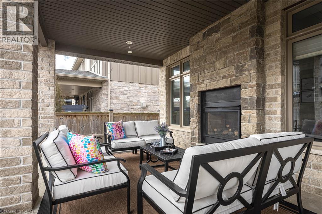 View of patio / terrace with an outdoor living space with a fireplace - 2719 Torrey Pines Way, London, ON - Outdoor With Fireplace With Deck Patio Veranda With Exterior