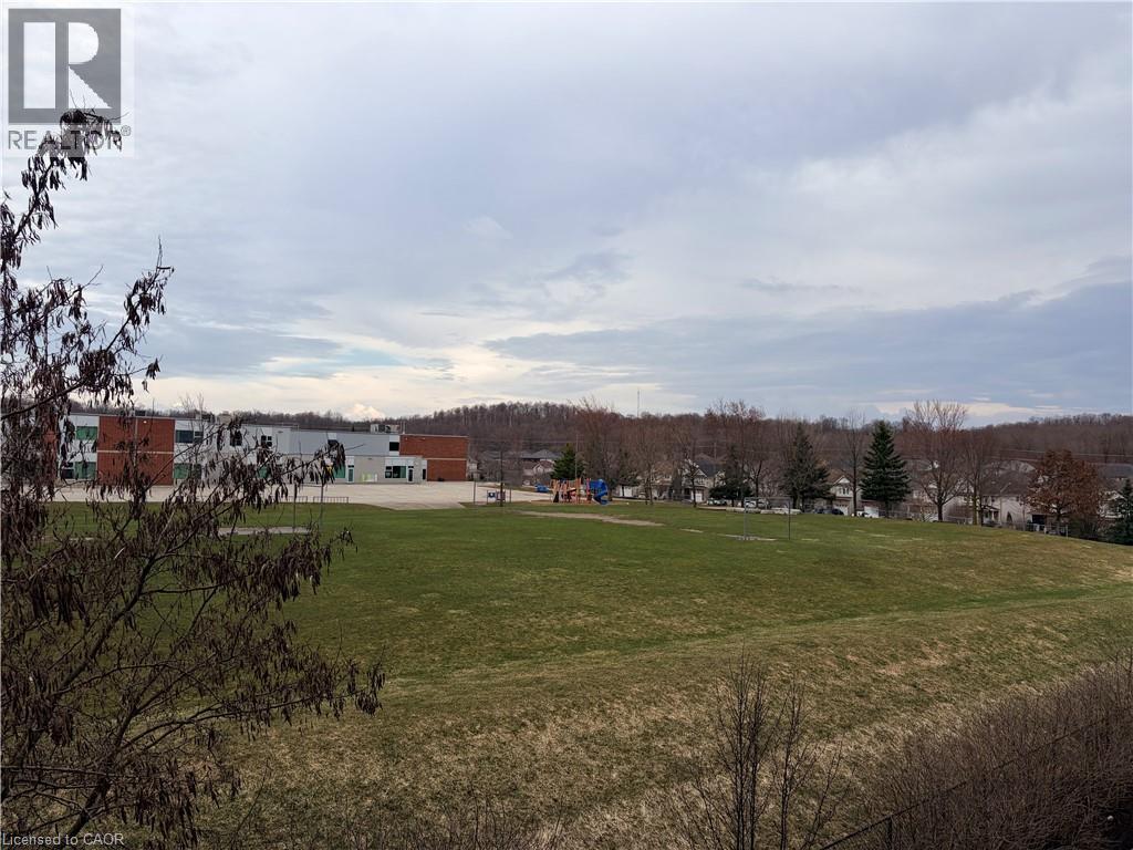 View of yard - 776 Laurelwood Drive Unit# 406, Waterloo, ON - Outdoor With View