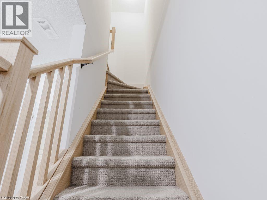 View of stairway - 1206 Main Street E Unit# 113, Milton, ON - Indoor Photo Showing Other Room
