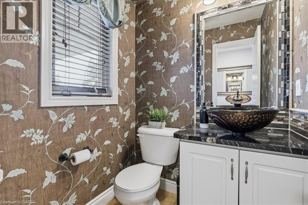 Stylish mainfloor powder room - 26 Helena Feasby Street, Kitchener, ON - Indoor Photo Showing Bathroom