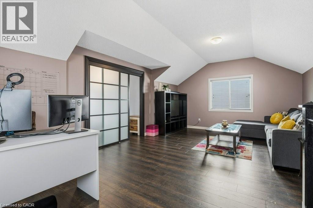 Amazing upper loft adds a large family room and a 4th bedroom - 26 Helena Feasby Street, Kitchener, ON - Indoor Photo Showing Other Room