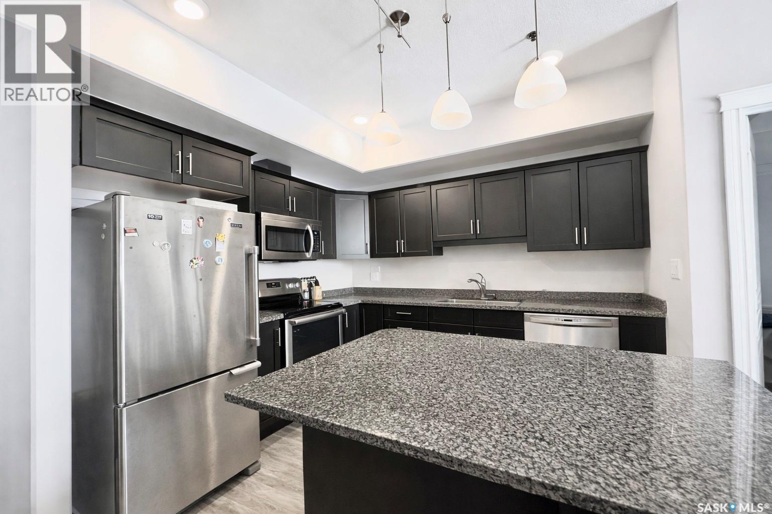 309 412 Willowgrove Square, Saskatoon, SK - Indoor Photo Showing Kitchen With Upgraded Kitchen