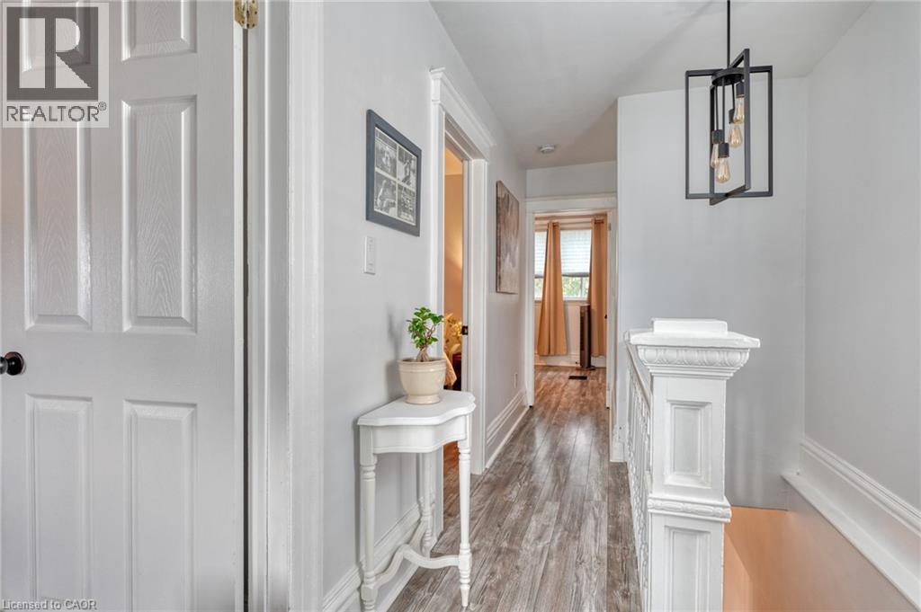 Hall with light wood-style floors and baseboards - 37 Cliff Avenue, Hamilton, ON - Indoor Photo Showing Other Room