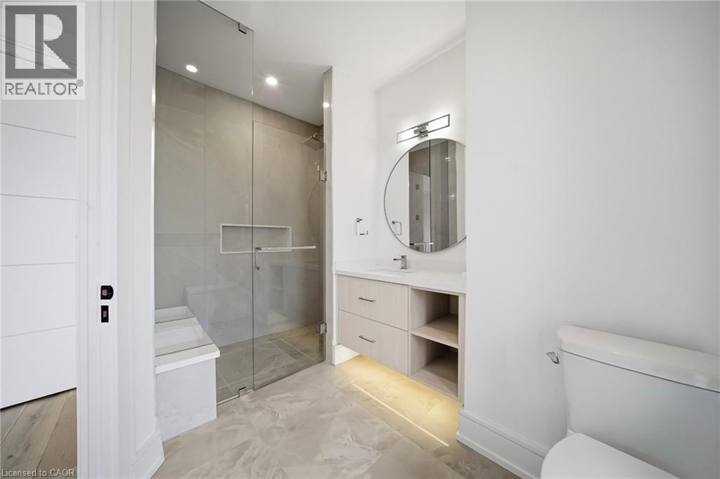 Full bathroom with vanity, a stall shower, and recessed lighting - 2556 Glengarry Road, Mississauga, ON - Indoor Photo Showing Bathroom