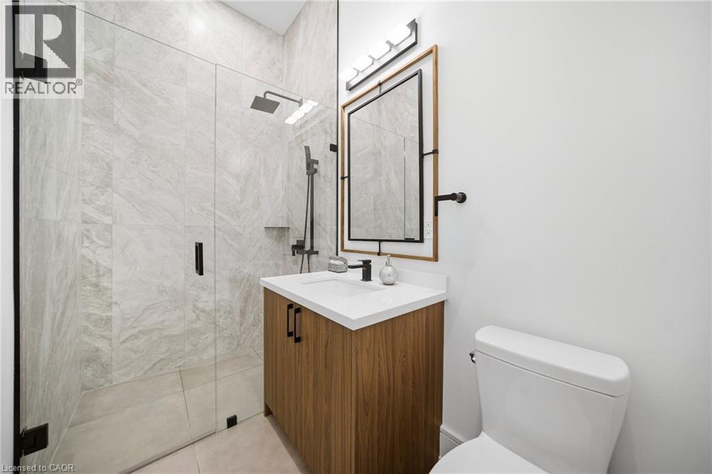 Full bath featuring vanity and a shower stall - 2556 Glengarry Road, Mississauga, ON - Indoor Photo Showing Bathroom