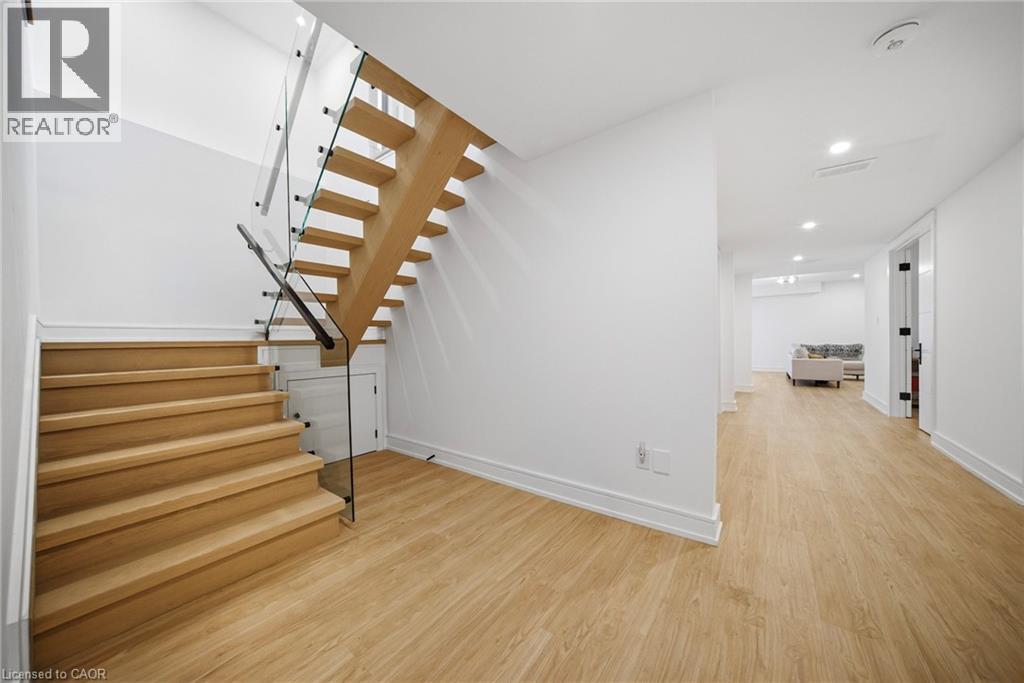 Stairs featuring wood finished floors and recessed lighting - 2556 Glengarry Road, Mississauga, ON - Indoor Photo Showing Other Room