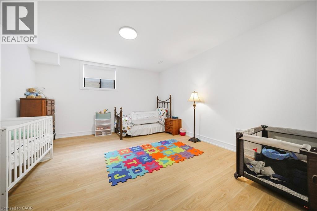 Bedroom featuring light wood-type flooring - 2556 Glengarry Road, Mississauga, ON - Indoor