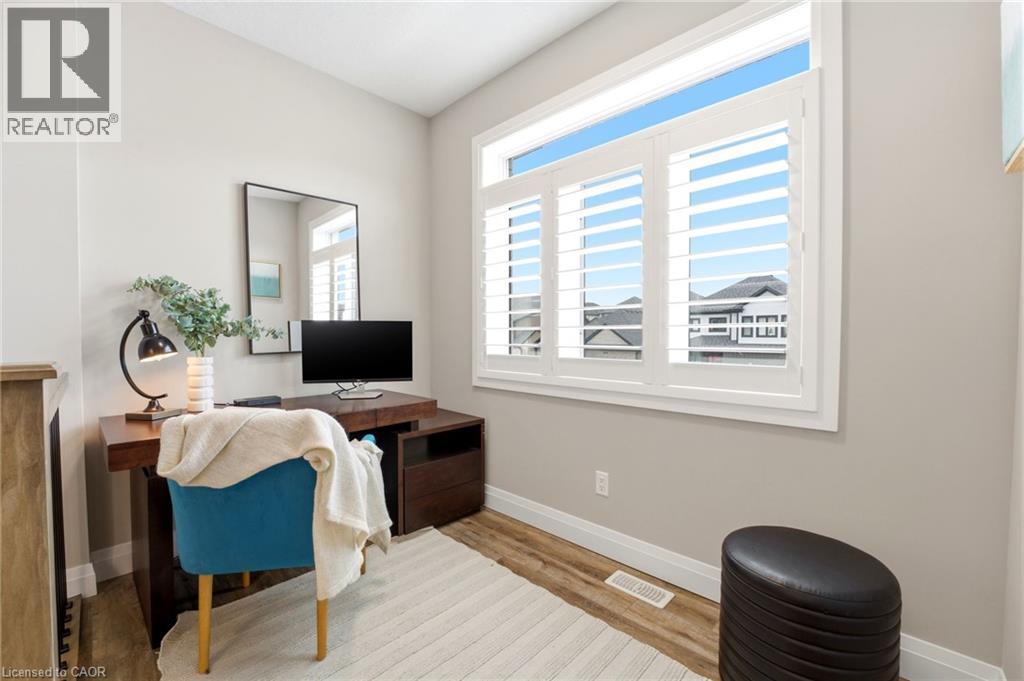 Home office featuring baseboards and light wood finished floors - 39 Mill Race Crescent, St. Jacobs, ON - Indoor Photo Showing Office