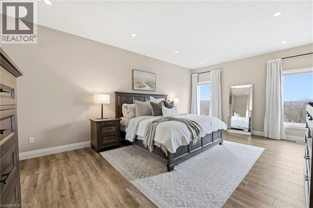 Bedroom with light wood-style flooring and recessed lighting - 39 Mill Race Crescent, St. Jacobs, ON - Indoor Photo Showing Bedroom