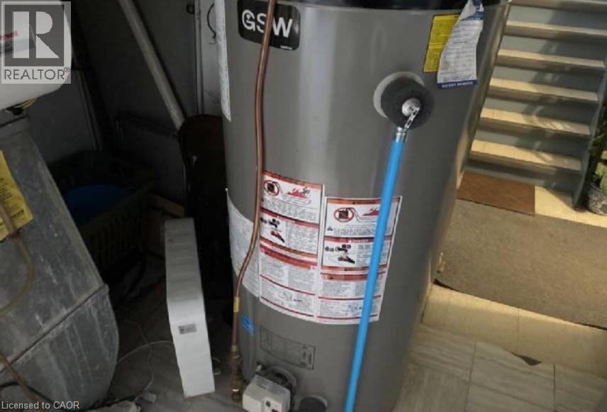 water heater - 31 Southdale Avenue, Kitchener, ON - Indoor Photo Showing Basement