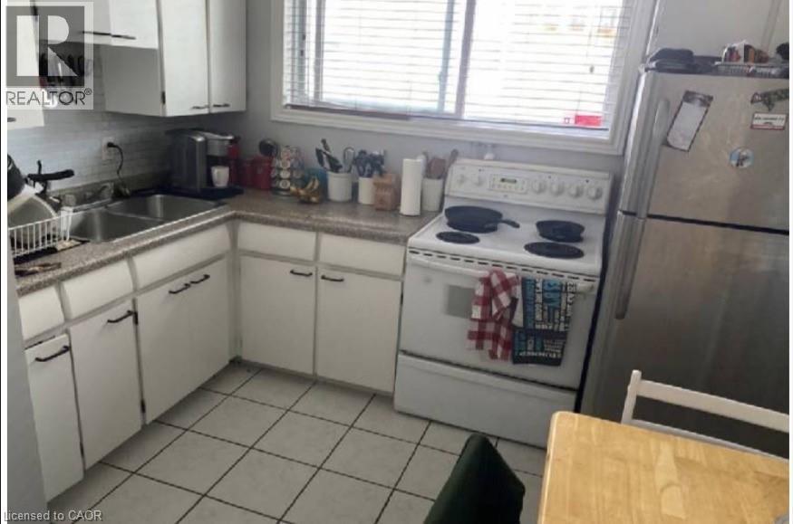 Upper Unit Kitchen - 31 Southdale Avenue, Kitchener, ON - Indoor Photo Showing Kitchen With Double Sink