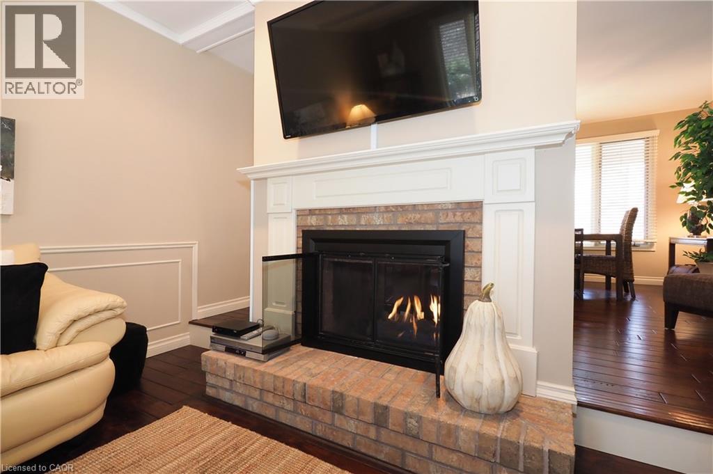 24 Primrose Path, Kitchener, ON - Indoor Photo Showing Living Room With Fireplace