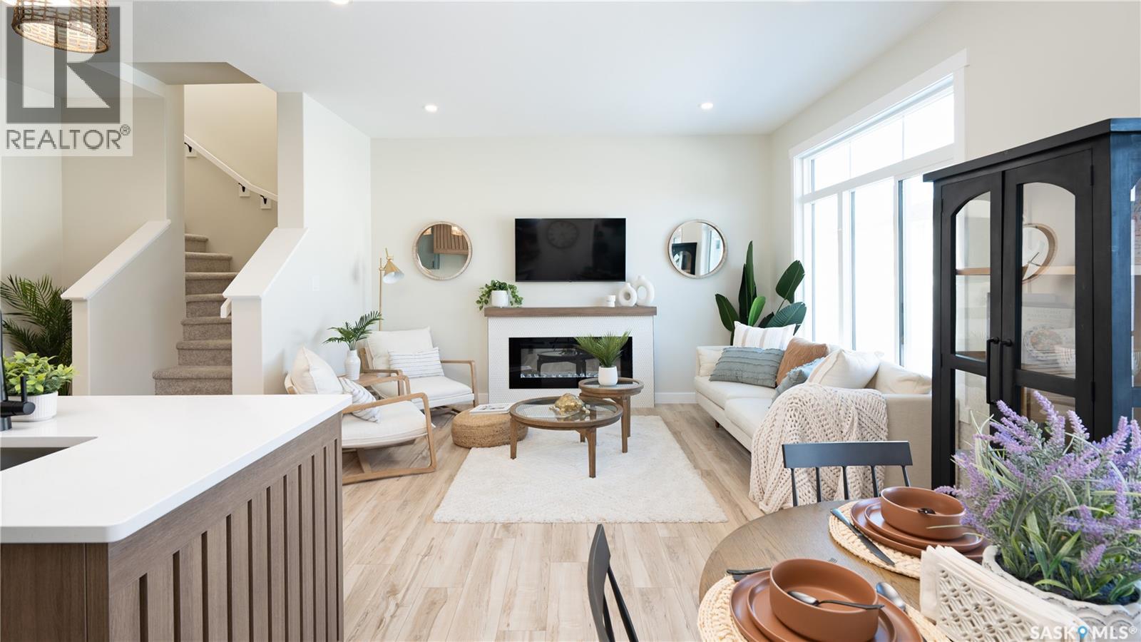 2986 Dumont Way, Regina, SK - Indoor Photo Showing Living Room With Fireplace