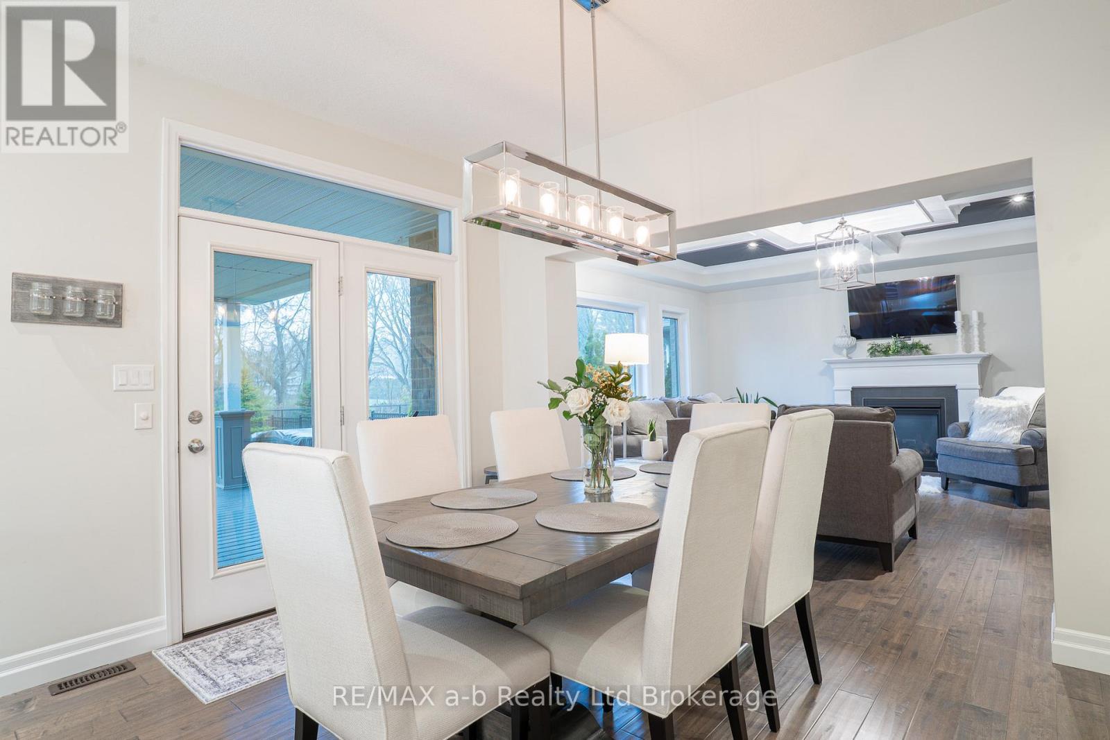 30 Brookside Lane, Tillsonburg, ON - Indoor Photo Showing Dining Room With Fireplace
