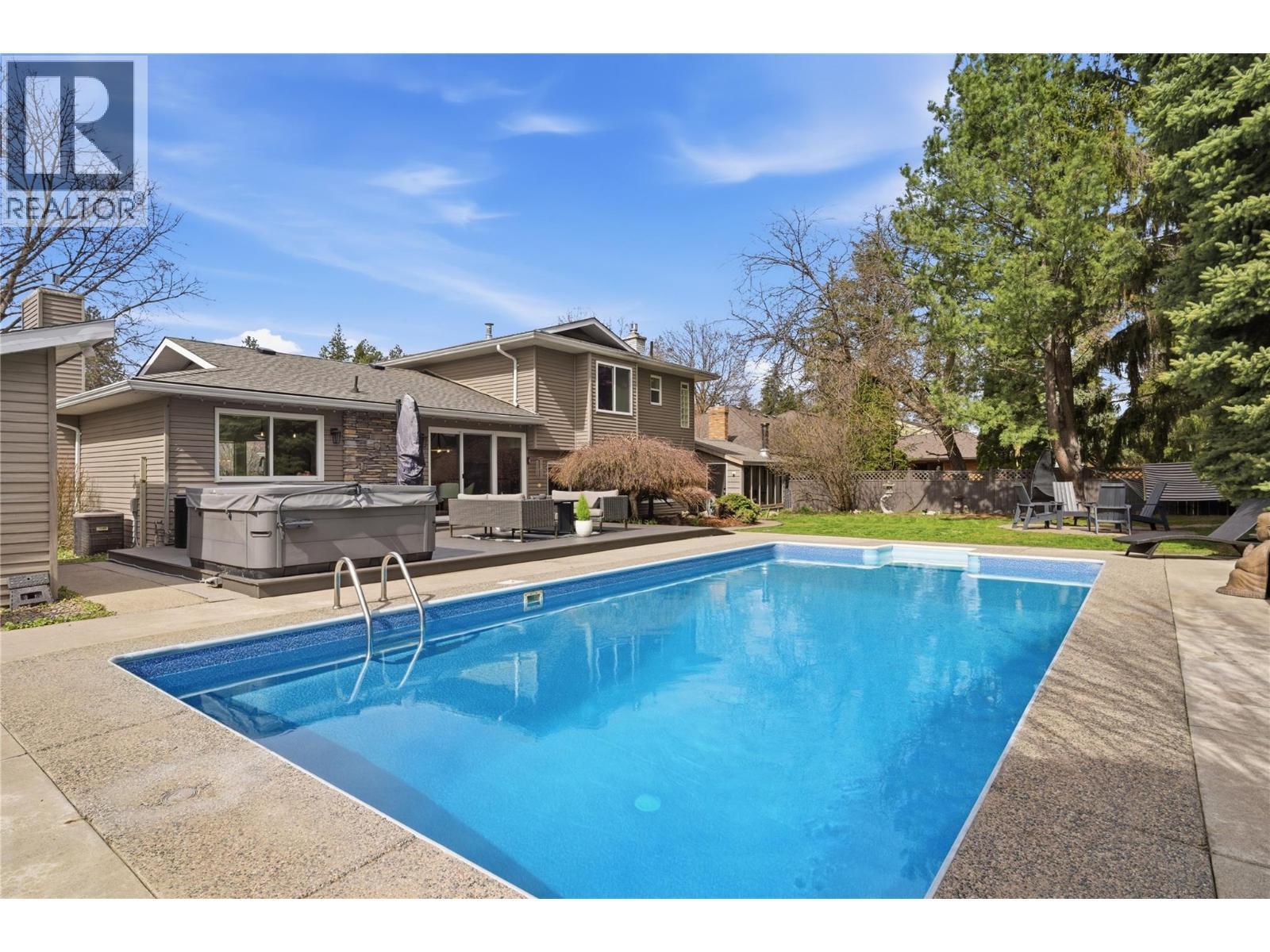 4337 Dunvegan Court, Kelowna, BC - Outdoor With In Ground Pool With Backyard
