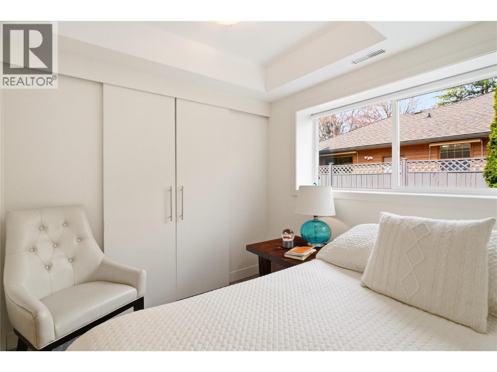 4th bedroom (lower level) - 4337 Dunvegan Court, Kelowna, BC - Indoor Photo Showing Bedroom