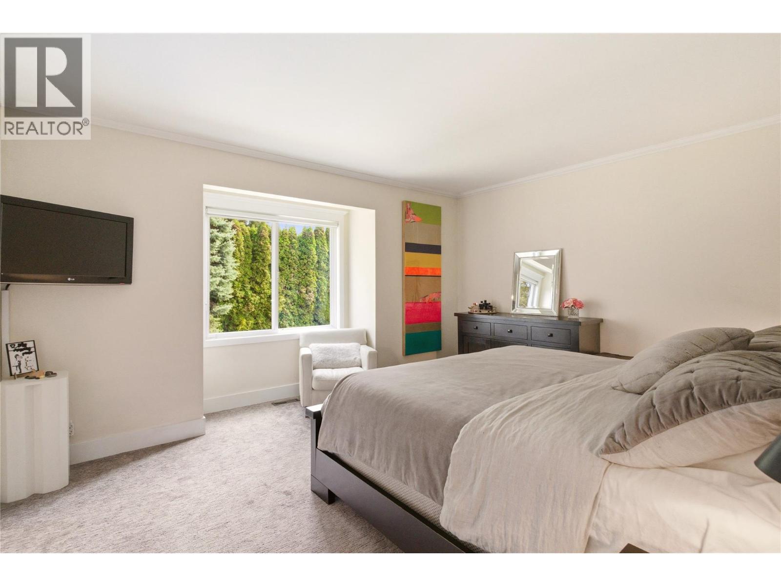Primary bedroom - 4337 Dunvegan Court, Kelowna, BC - Indoor Photo Showing Bedroom