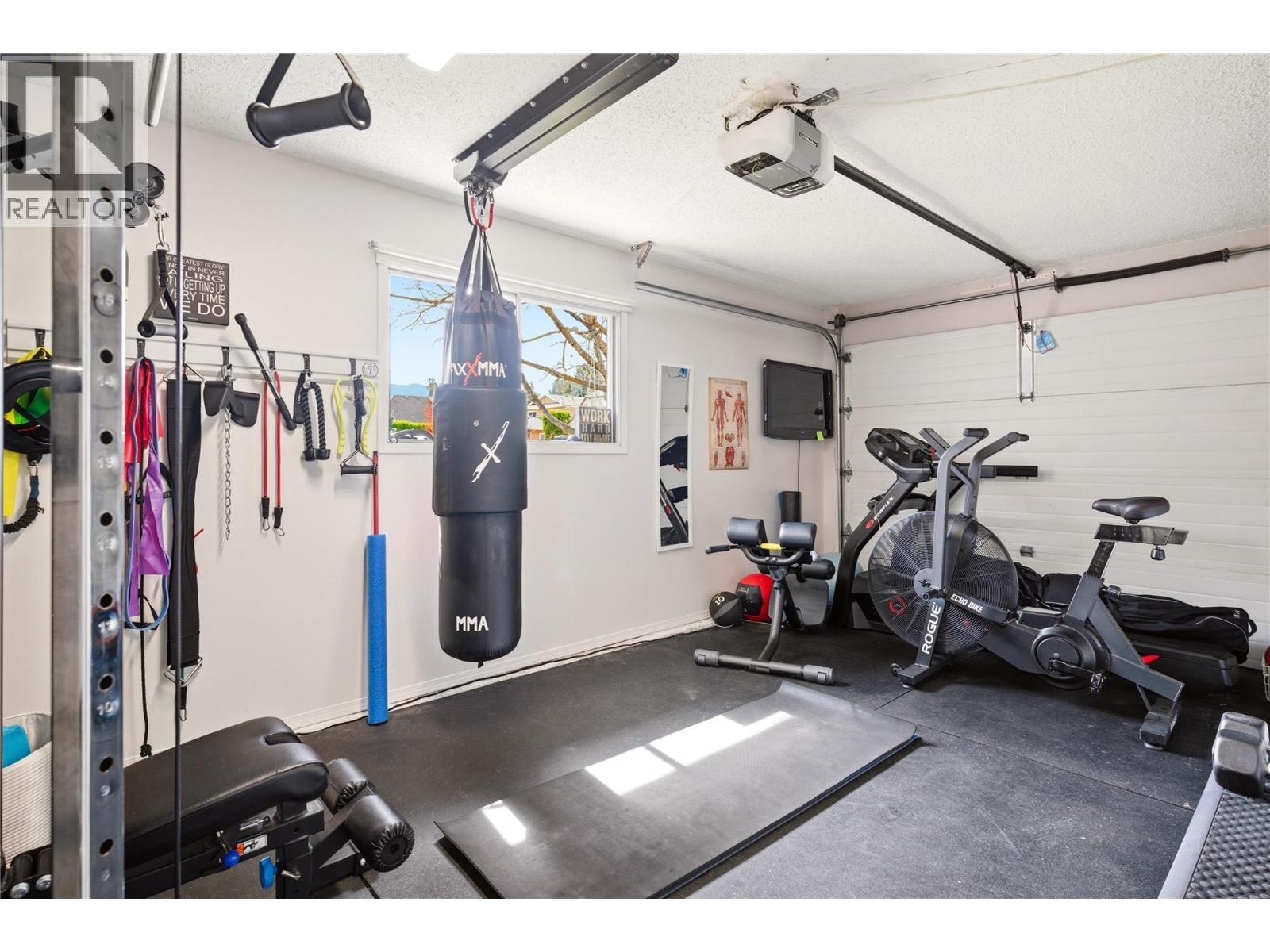 Garage - 4337 Dunvegan Court, Kelowna, BC - Indoor Photo Showing Gym Room