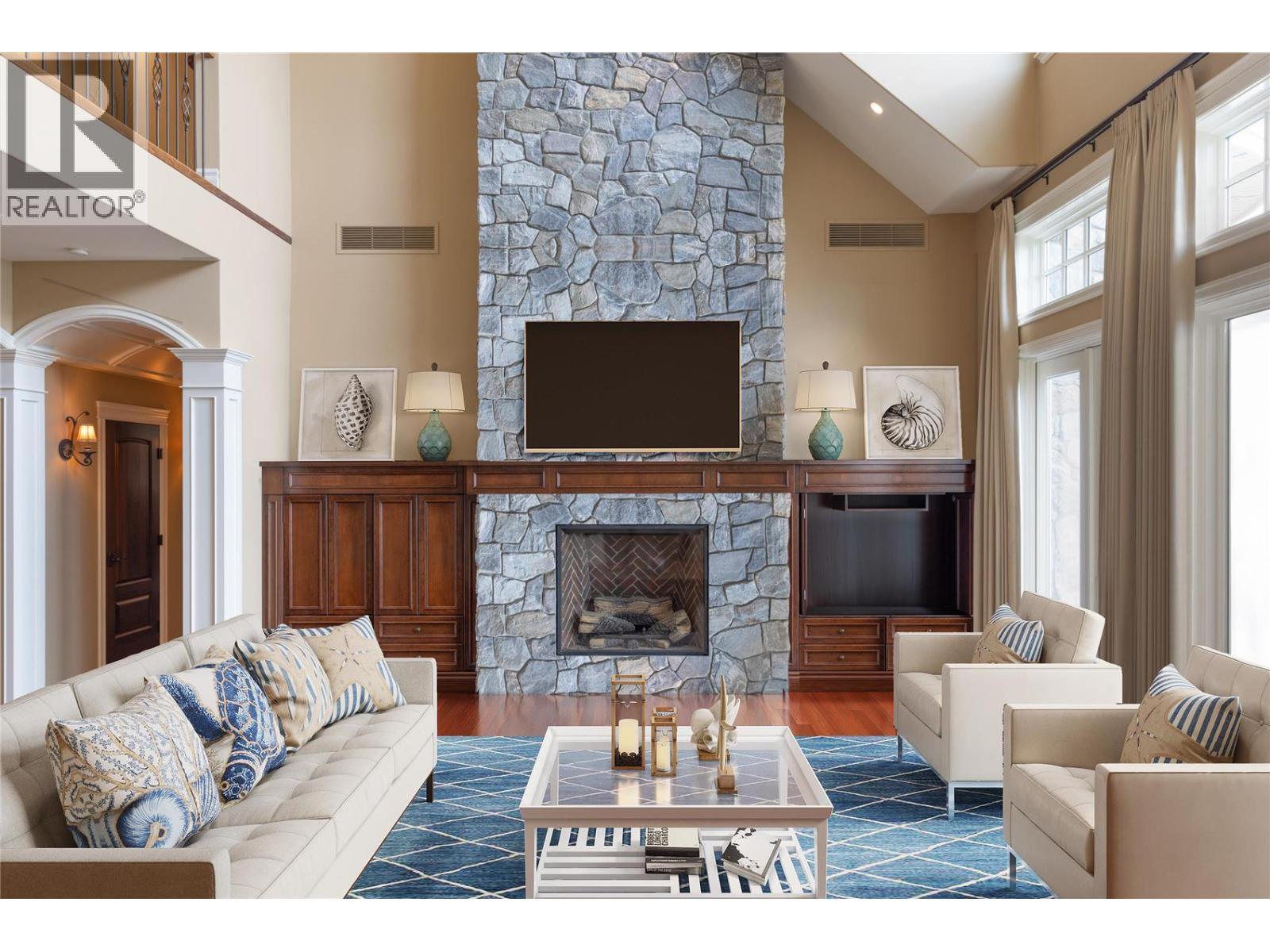Living rm virtually staged - 225 Swick Road, Kelowna, BC - Indoor Photo Showing Living Room With Fireplace