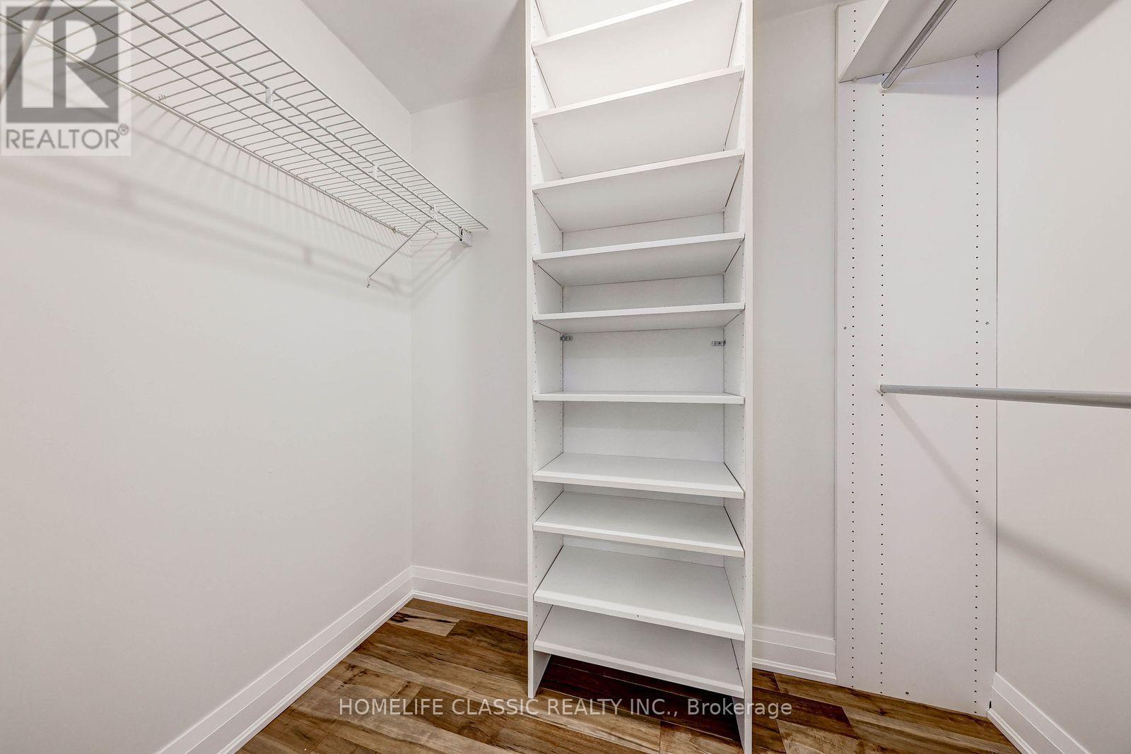 W/I Closet in Primary Bedroom - 56 Gray Crescent, Richmond Hill, ON - Indoor With Storage