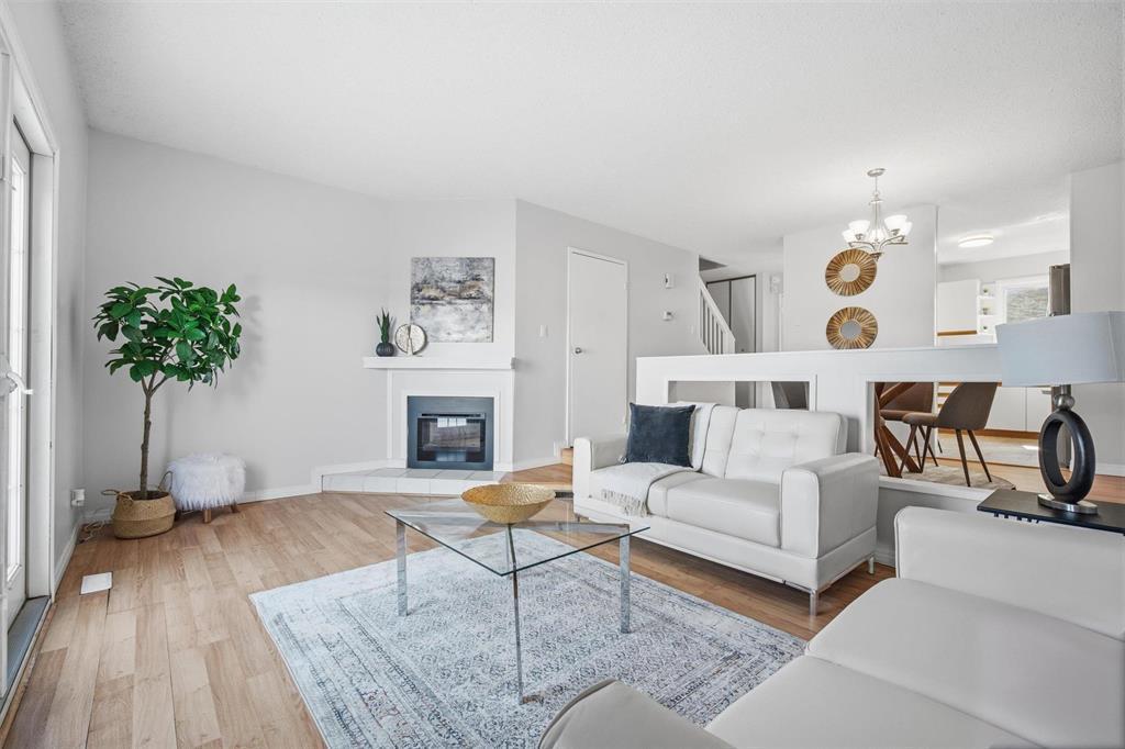 B 67 Apple Lane, Winnipeg, MB - Indoor Photo Showing Living Room With Fireplace