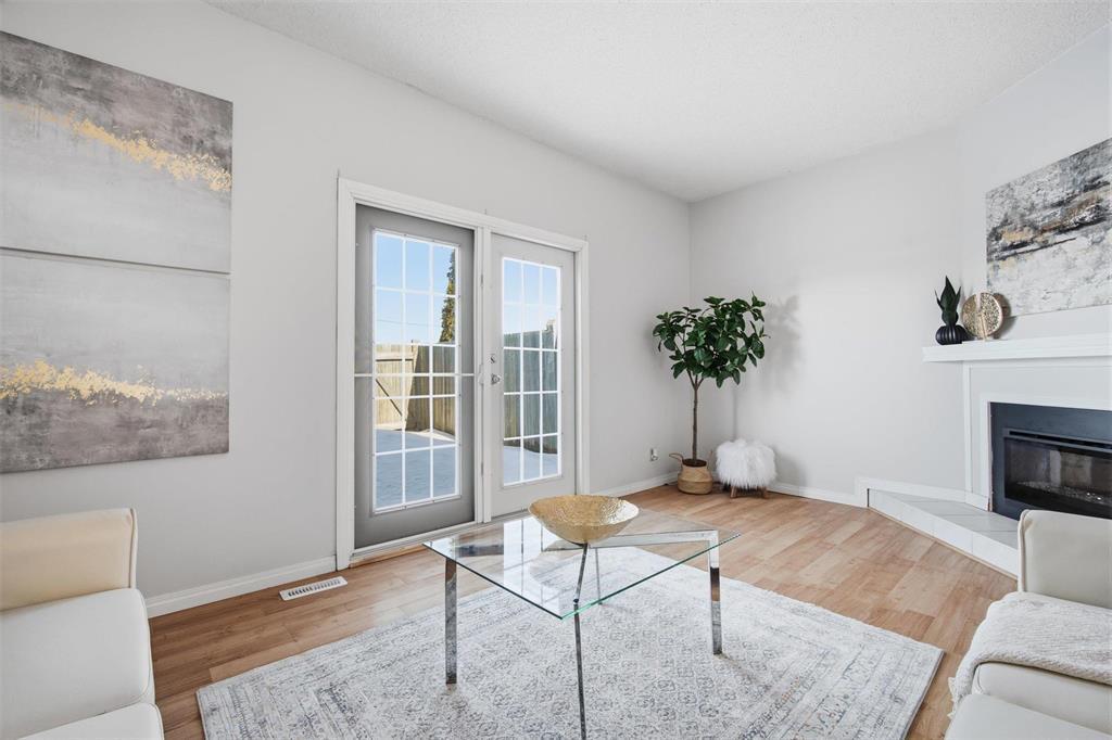 B 67 Apple Lane, Winnipeg, MB - Indoor Photo Showing Living Room With Fireplace