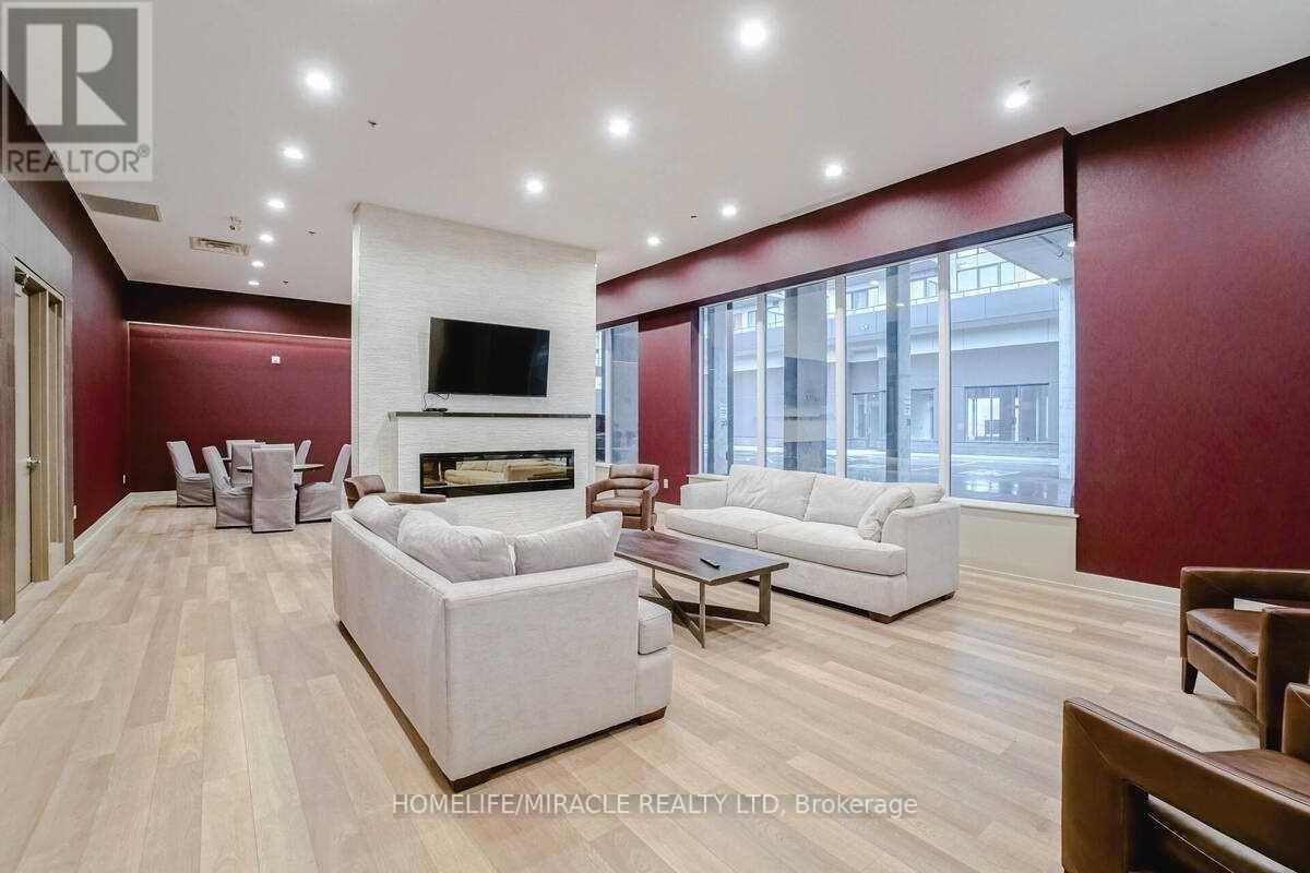 602 - 560 North Service Road, Grimsby, ON - Indoor With Fireplace