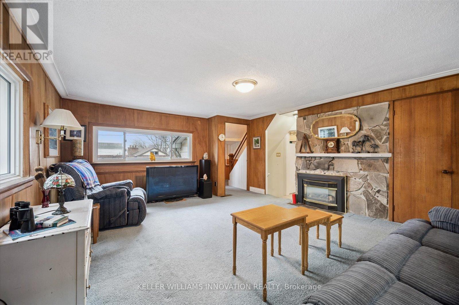 273 Thaler Avenue, Kitchener, ON - Indoor Photo Showing Living Room With Fireplace