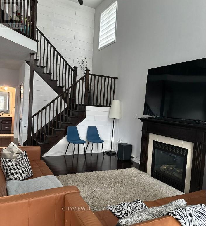 7 Woodvalley Court, Hamilton, ON - Indoor Photo Showing Living Room With Fireplace