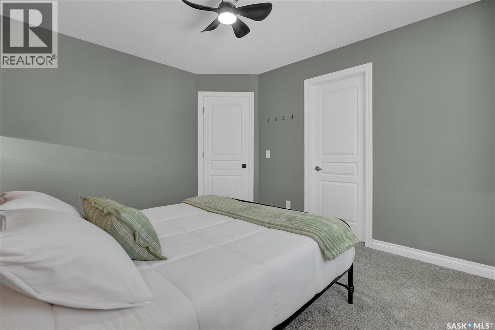 28 Emerald Creek Drive, White City, SK - Indoor Photo Showing Bedroom