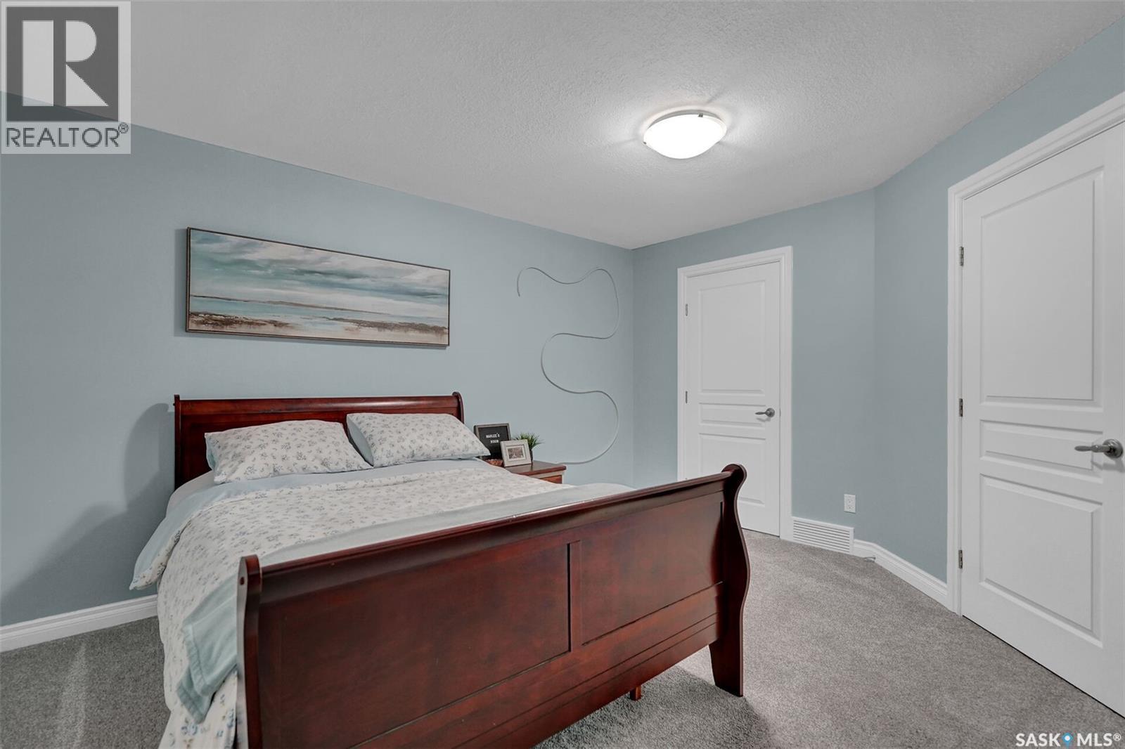 28 Emerald Creek Drive, White City, SK - Indoor Photo Showing Bedroom